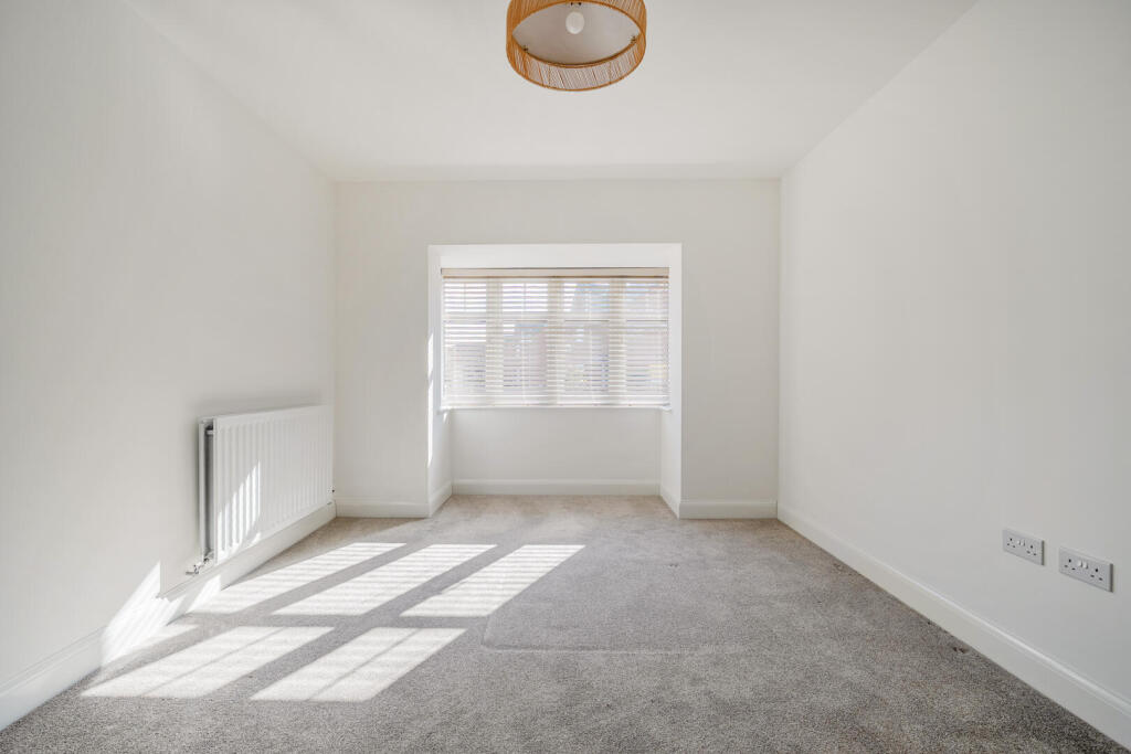 Actual photograph of the bay-fronted sitting room